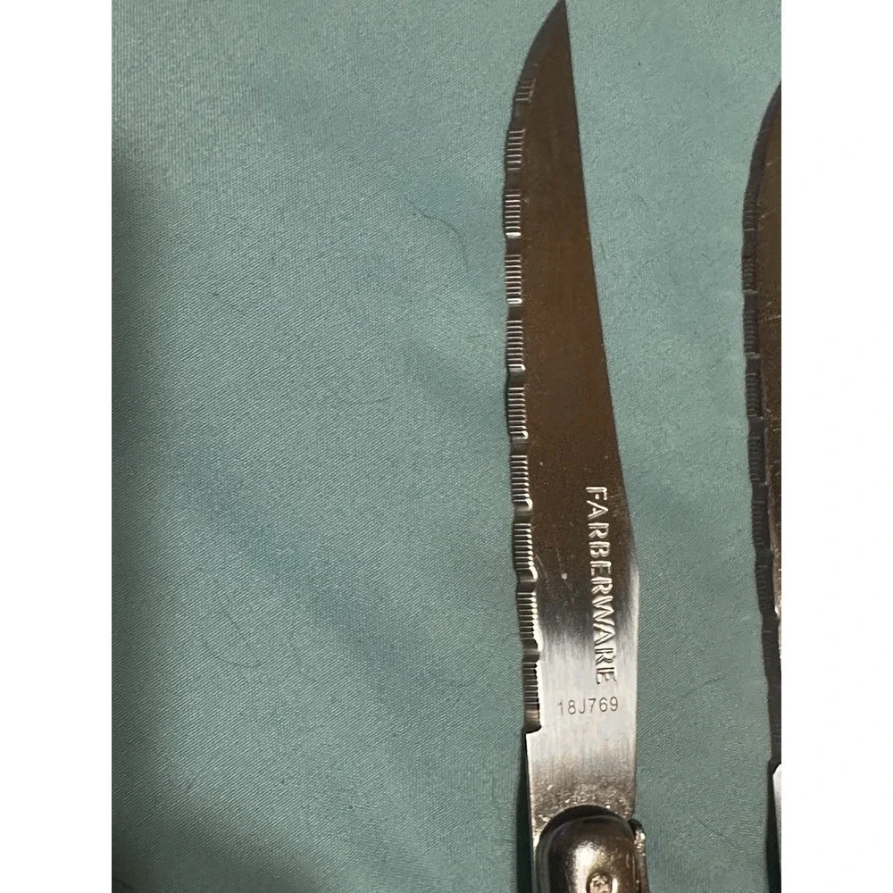 2Farberware 18H769 Fine Serrated Steak Knives,‎ W/ Black Scales